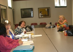 Olga Blaus, right, Ellie Lataweic and Beverly Barnes chat in the Will Barnett Room of the Beverly Public Library
